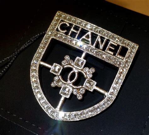 chanel brooch fake vs real|authentic chanel charm bracelets.